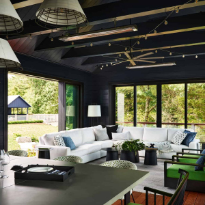 View of poolhouse from 4 season porch attached to house.