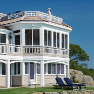 Gloucester three season room exterior with roof deck above