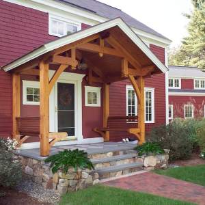 Front porch with hammer beam truss entry to match living room frame