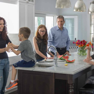 Throughout the space, the combination of farm style and contemporary details, and the contrasts of light and dark create a dramatic, cozy, and playful vibe.