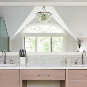 RELAXING RETREAT MASTER BATH--The large double vanity features Lacava undermount sinks, with a center makeup counter.