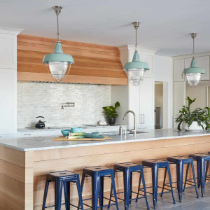 White oak paneled island with quartzite counter