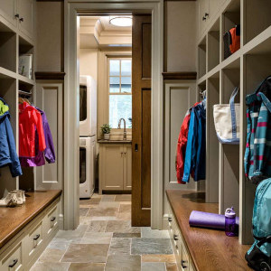 Mudroom with attached laundry room