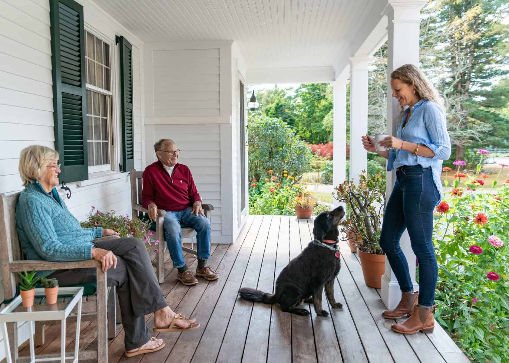The family often gathers on the porch, which connects the old and new spaces.