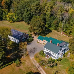 Berry Patch Farm is a six-acre property that used to operate as a pick-your-own blueberry farm in Boxford, Massachusetts. Its 1830 house is a traditional two-and-a-half-story Georgian Colonial. A new addition replaced the old west wing, which were piecemeal additions used for animals and storage.