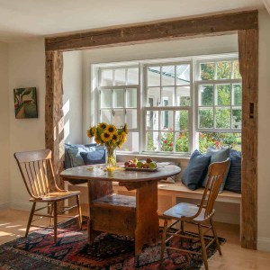 The beams decorating the window seat of the breakfast area were salvaged from the original “west wing” that had stood in this  spot.