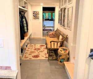 The entry includes a mudroom that can be accessed from both the old and the new spaces.