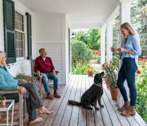 The family often gathers on the porch, which connects the old and new spaces.