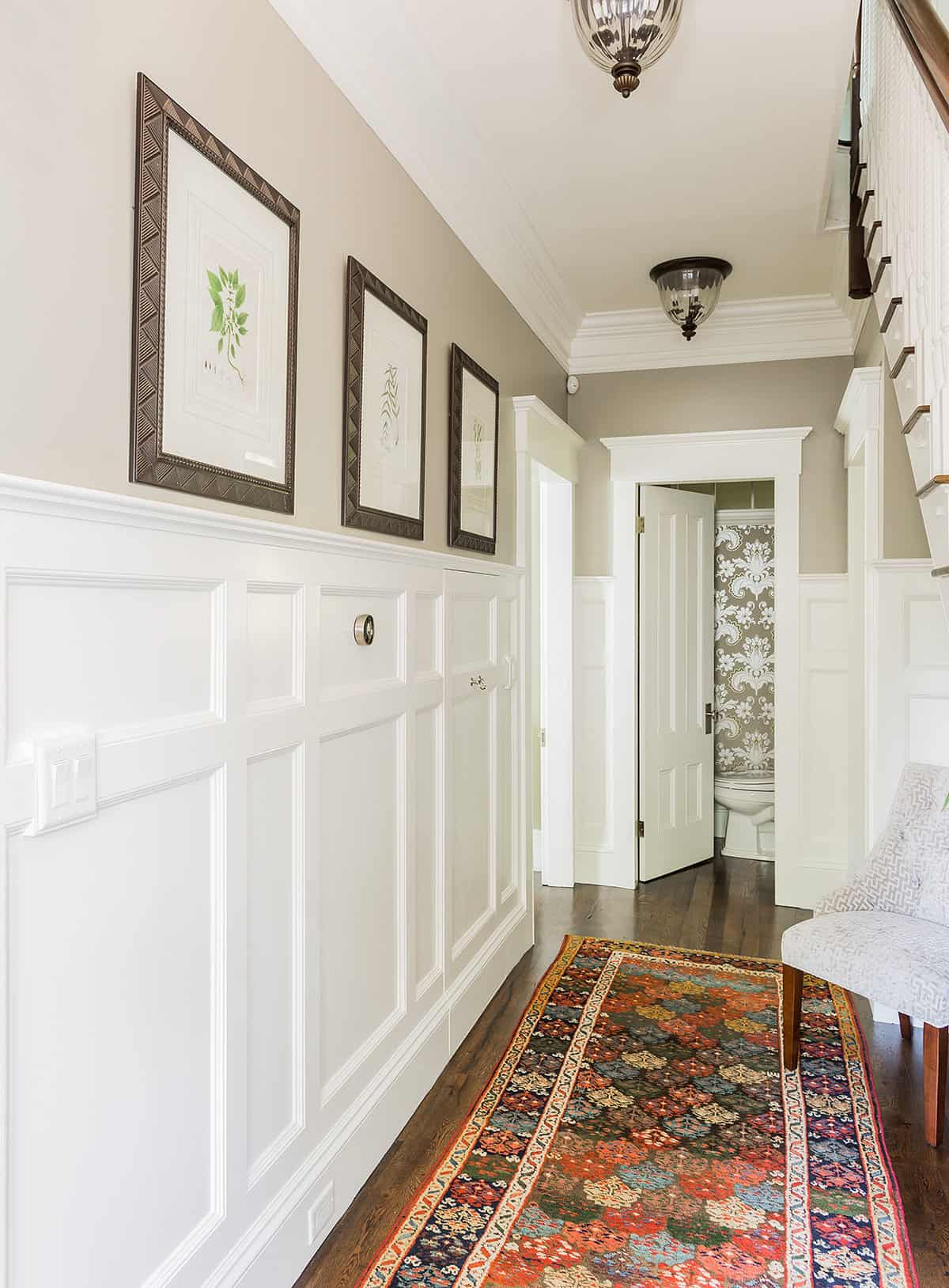 Front Hall with high wainscot paneling