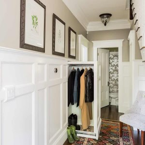 Hidden slide-out coat closet