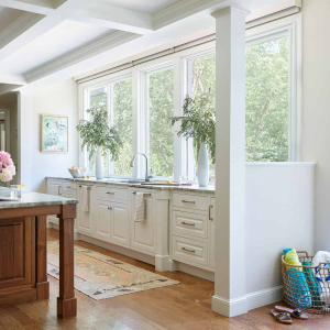 AFTER-The-new-bump-out-which-has-9’-ceilings-and-a-wall-of-large-windows-floods-the-kitchen-with-light-and-backyard-views.-2