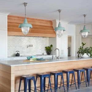 White oak paneled island with quartzite counter