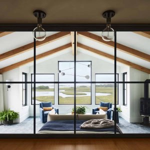 COASTAL MODERN FARMHOUSE OWNER'S SUITE, VIEW FROM WALK-IN CLOSET THROUGH INTERIOR GLASS