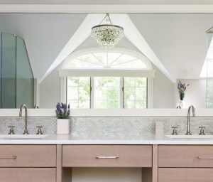 RELAXING RETREAT MASTER BATH--The large double vanity features Lacava undermount sinks, with a center makeup counter.