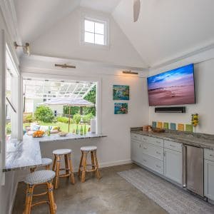 Poolhouse kitchen with TV