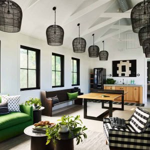 The poolhouse interior hosts a lounge/game area, kitchenette, storage closet, and bathroom