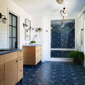Primary Bathroom-white oak vanities flank  the water closet doorway