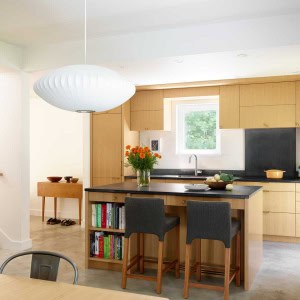 Built for a family of three, the home offers minimalist, but comfortable open plan living.