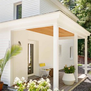 The goal was to create a minimalist home, with understated rural modernism. The architecture features New England farmhouse vernacular and an industrial chic interior.