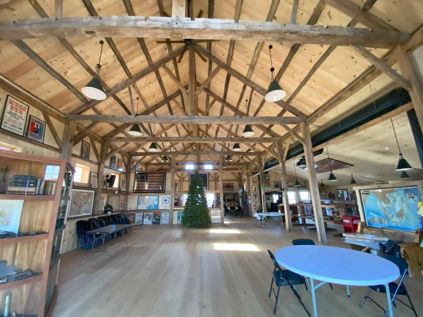 AFTER: The renovated 1793 barn interior features the exposed reconstructed antique timber frame.