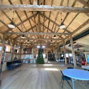 AFTER: The renovated 1793 barn interior features the exposed reconstructed antique timber frame.