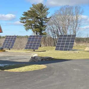 A solar array next to the sugaring barn contributes to making the property net-zero -- it produces more energy than it uses.