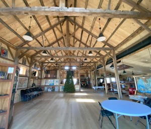 AFTER: The renovated 1793 barn interior features the exposed reconstructed antique timber frame.