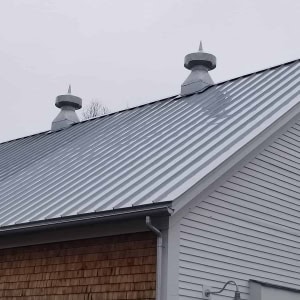 Restored Barn with Galvalume Metal Roof, typical to all the restored buildings