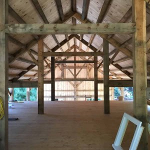 The ibarn hand-cut timber frame was made from trees that were felled on the property.