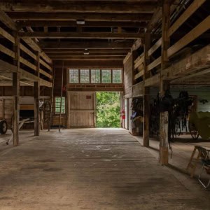 The original barn was a hand hewn English frame. The frame was restored by Preservation Timber Framing.