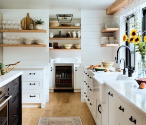 This kitchen was renovated as part of a whole house transformation.  A new walk-in pantry is tucked away where the original center chimney was removed.