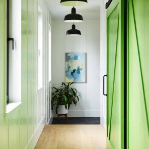 Coastal Modern Farmhouse Entry Hall with Barn Door Closet