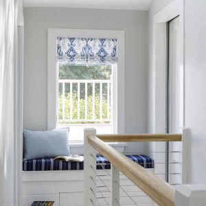 Second Floor landing with view to roof deck --original balusters were replaced with a cable rail, modernizing the staircase, allowing light to flow through.