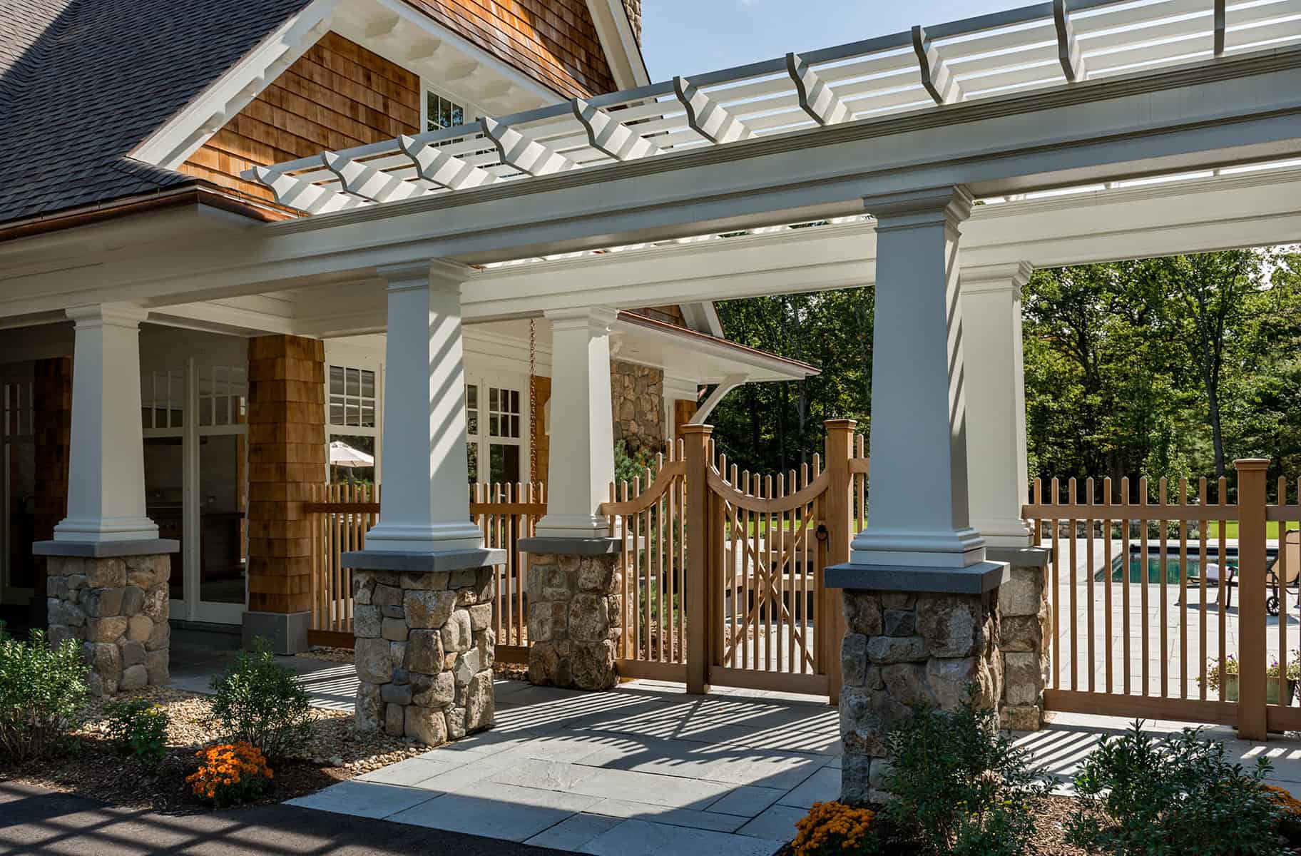 Pergola connects the pool house to the main house.