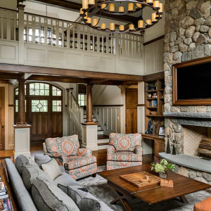 Living room towards front door. 2nd floor bridge  overlooks entry and living room.
