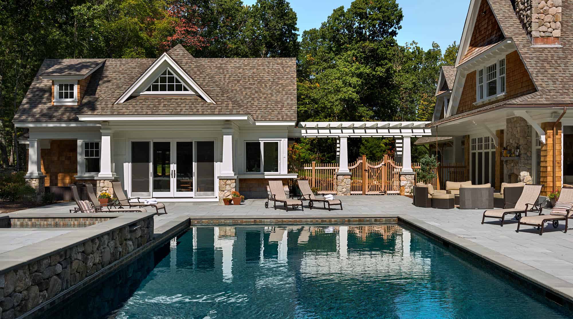 Cottage Style Pool House with Pergola connector to house