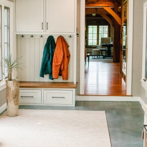 Breezeway Mudroom built-in  with walnut bench and shoe drawers