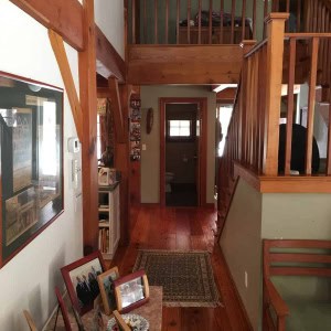 BEFORE View from living room to powder room. Wall to left was removed