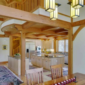 View towards kitchen. A loft balcony overlooks the living room